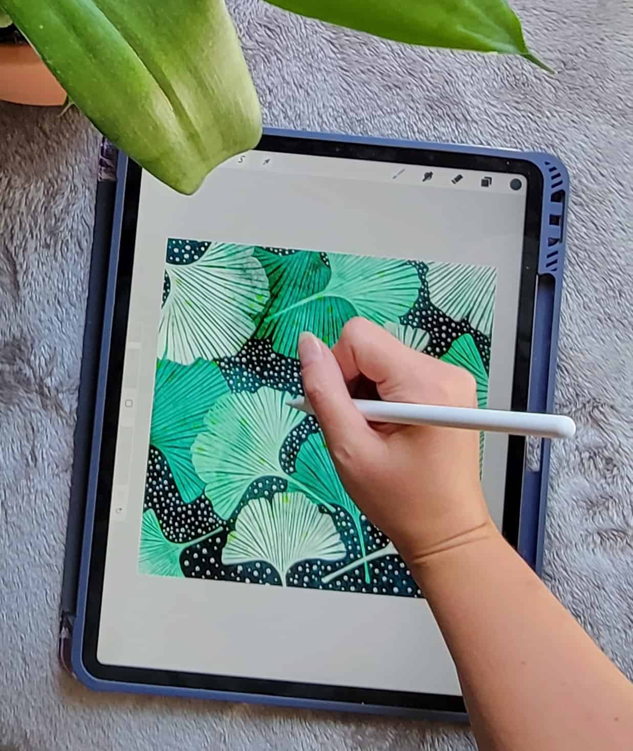 ipad with hand drawing on the procreate app