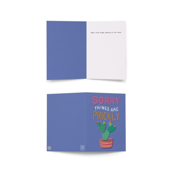 greeting-card-5x7-front-6a05da2a85c47.jpg A colorful greeting card with a cactus illustration and playful text, "Sorry, things are prickly.".