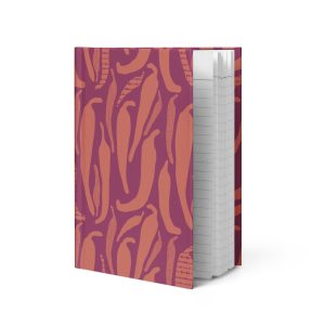 Chili pepper southwest pattern journal with hand-drawn peppers in terracotta on deep berry hardcover notebook