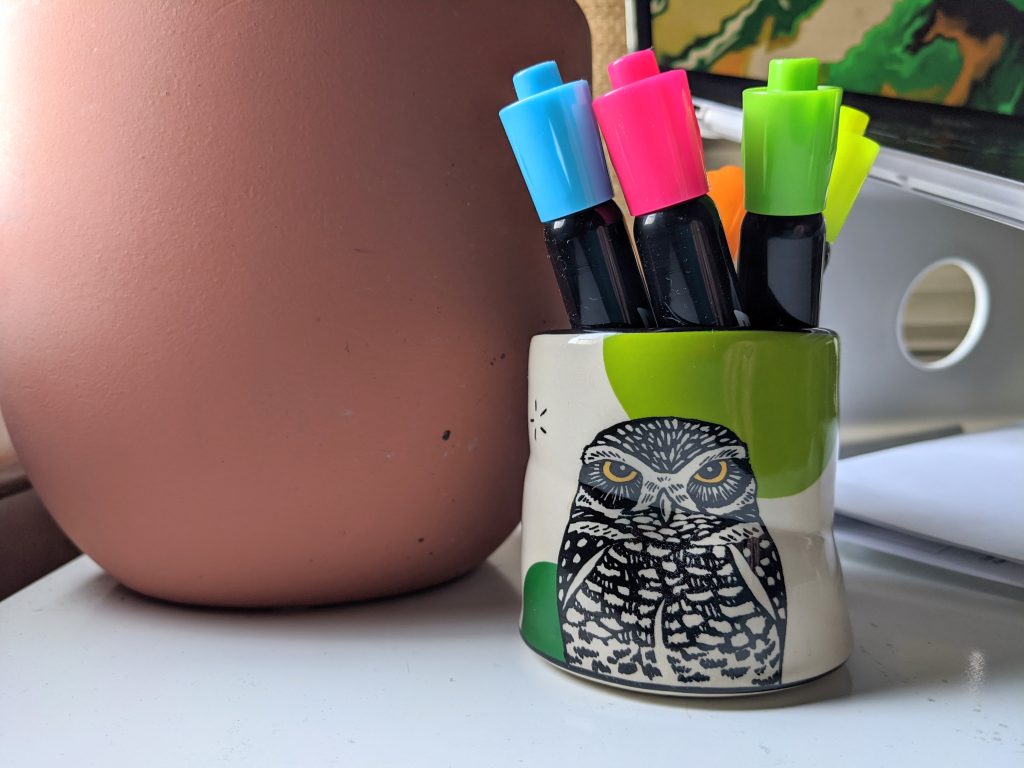 highlighters in a cup