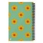 Vibrant yellow flower pattern notebook cover on pastel green background.