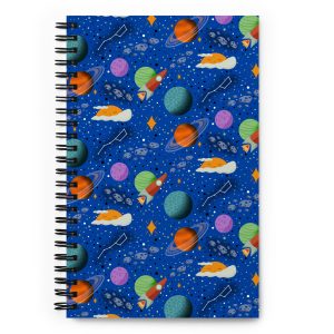 space themed notebook with rockets, planets, and sleepy suns