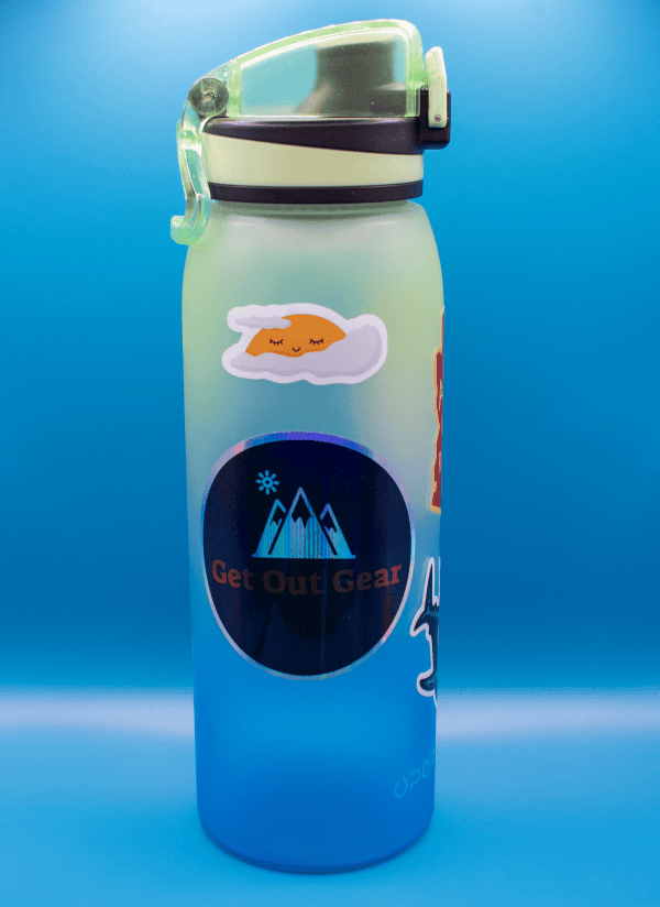 sun sticker on water bottle zoomed out 2000px Water bottle with mountain and sun sticker, Get Out Gear logo, hydration, outdoor gear, travel water container.