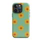 Yellow floral iPhone case with green background for stylish phone protection.