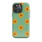 Colorful floral phone case with yellow flowers on mint green background.
