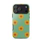Vivid floral phone case with yellow flowers on mint green background for iPhone 13 Pro. Illustrated by Arizona-based artist Nicole Peery.